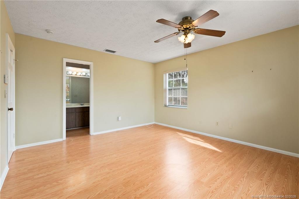 2493 Southwest Murphy Road Palm City, FL 34990 - Photo 26 of 50 a view of an empty room with a window