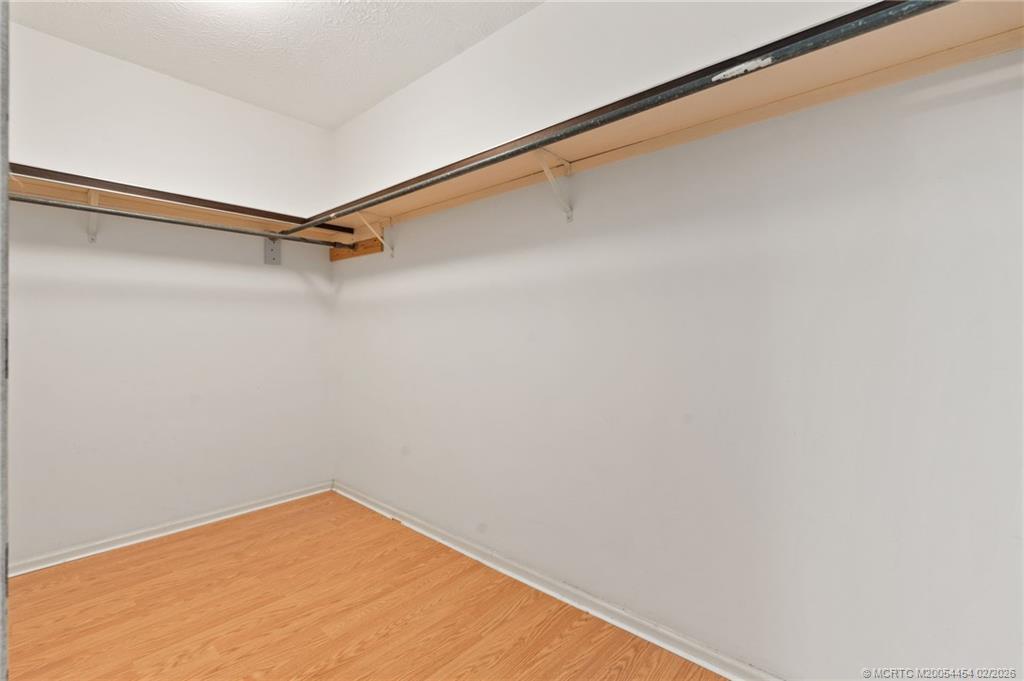 2493 Southwest Murphy Road Palm City, FL 34990 - Photo 30 of 50 a view of a room with shelf
