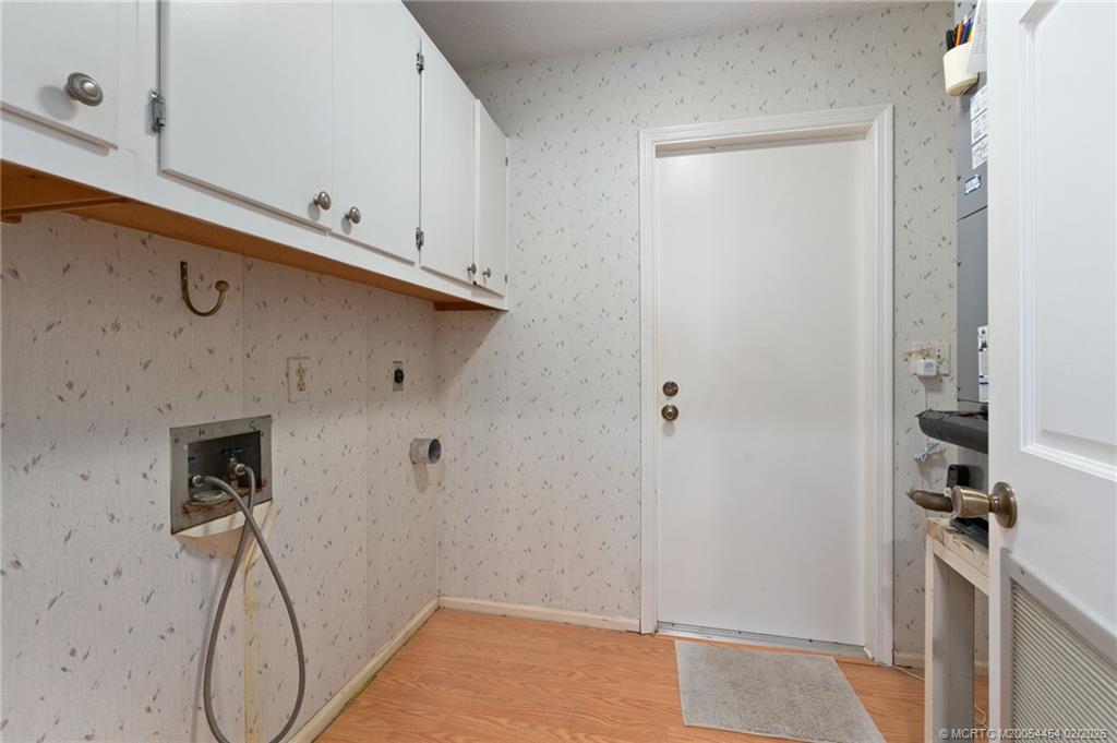2493 Southwest Murphy Road Palm City, FL 34990 - Photo 32 of 50 a view of a livingroom and entryway