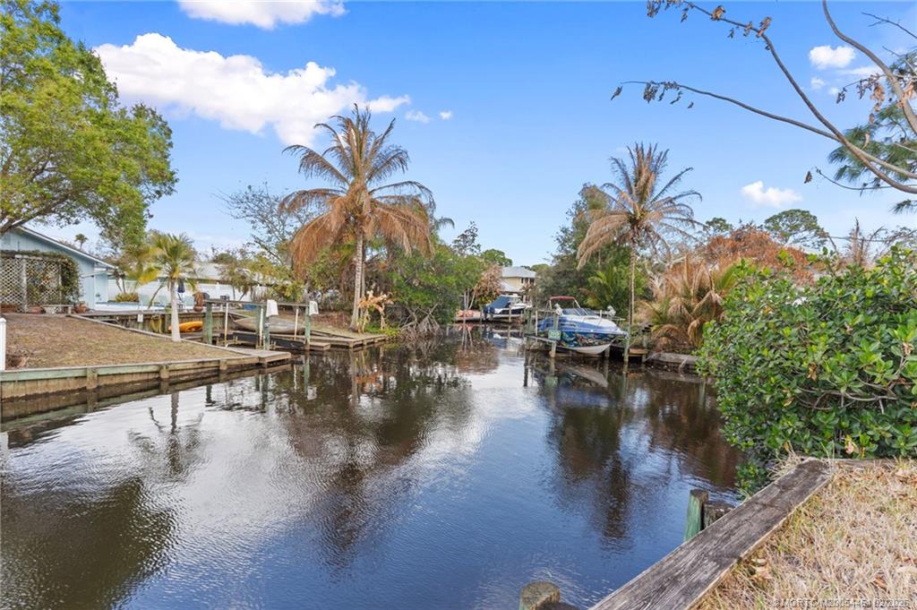 2493 Southwest Murphy Road Palm City, FL 34990 - Photo 42 of 50 a view of a lake with houses