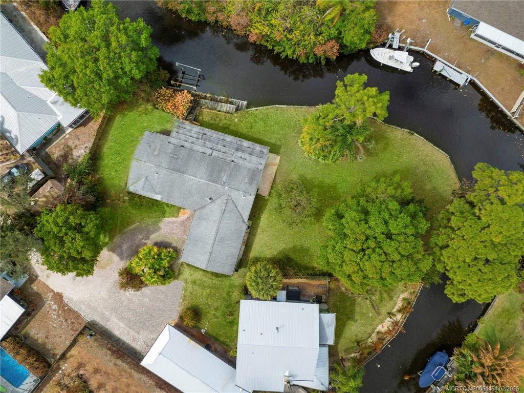 2493 Southwest Murphy Road Palm City, FL 34990 - Photo 46 of 50 an aerial view of a house with a yard
