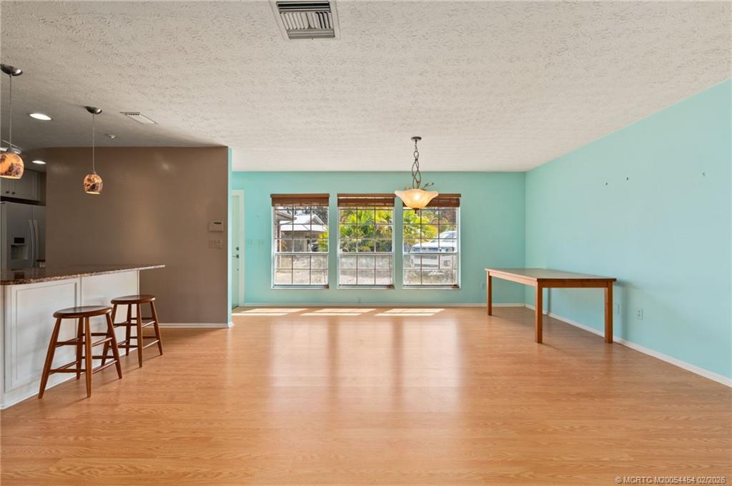 2493 Southwest Murphy Road Palm City, FL 34990 - Photo 8 of 50 a view of an empty room with a window