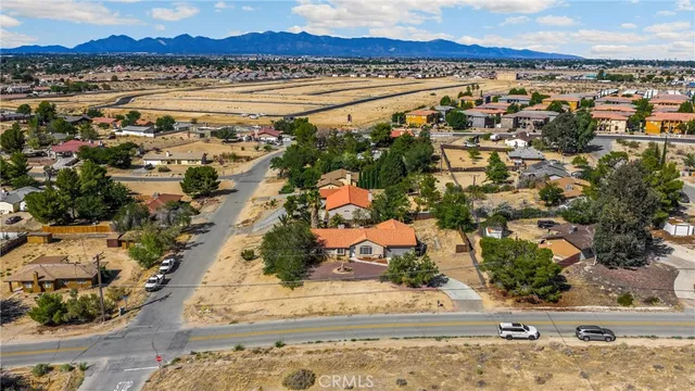 a view of a backyard with a slide