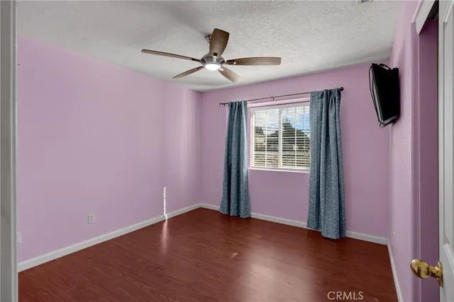 a kitchen with stainless steel appliances granite countertop a sink dishwasher stove and refrigerator