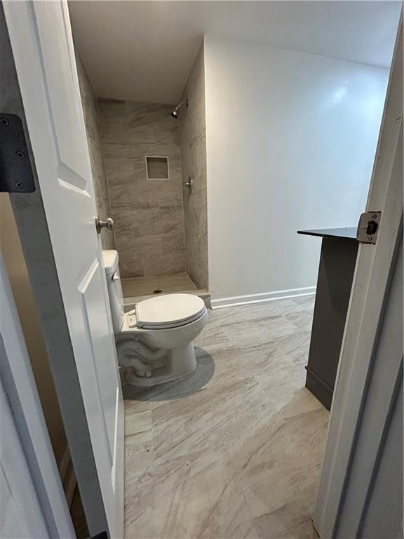 1665 Avon Avenue Southwest Atlanta, GA 30311 - Photo 11 of 15 a bathroom with a sink and a toilet