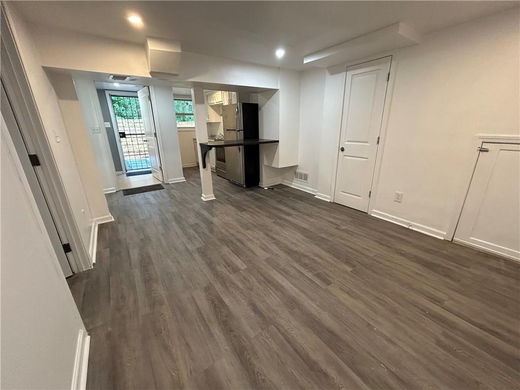 1665 Avon Avenue Southwest Atlanta, GA 30311 - Photo 14 of 15 a view of empty room with wooden floor and fan