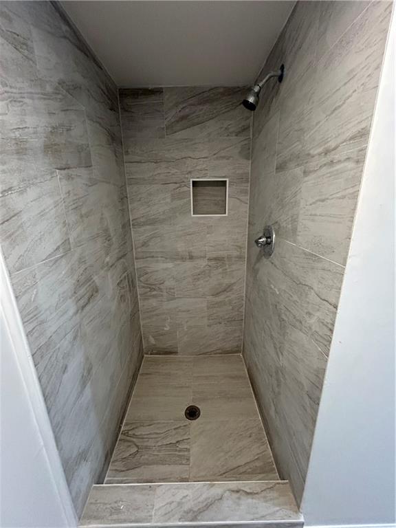 1665 Avon Avenue Southwest Atlanta, GA 30311 - Photo 2 of 15 a bathroom with a shower