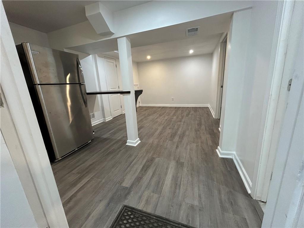 1665 Avon Avenue Southwest Atlanta, GA 30311 - Photo 7 of 15 a view of entryway with wooden floor