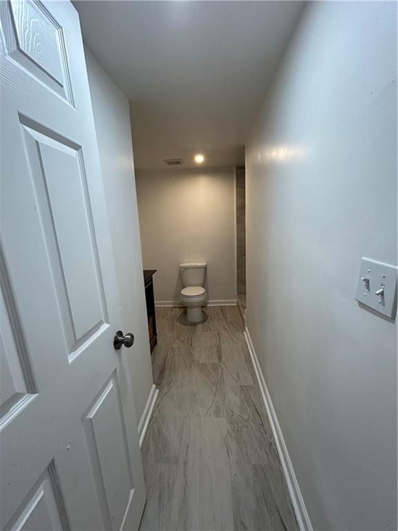 1665 Avon Avenue Southwest Atlanta, GA 30311 - Photo 9 of 15 a view of a room with wooden floor