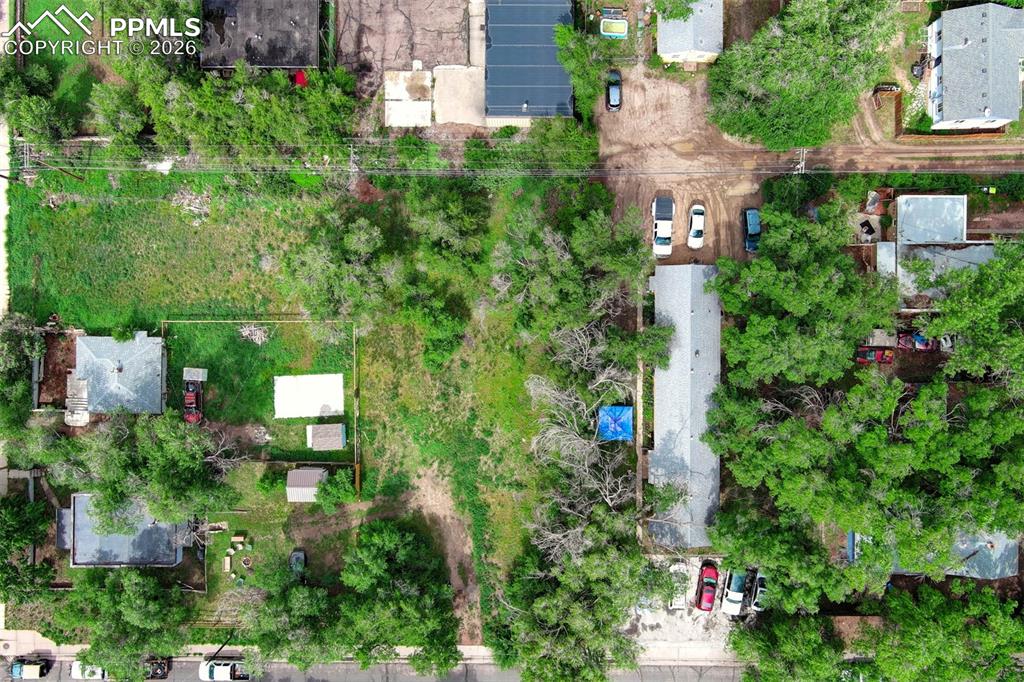 508 Sunset Road Colorado Springs, CO 80909 - Photo 11 of 11 an aerial view of residential house with outdoor space and trees all around