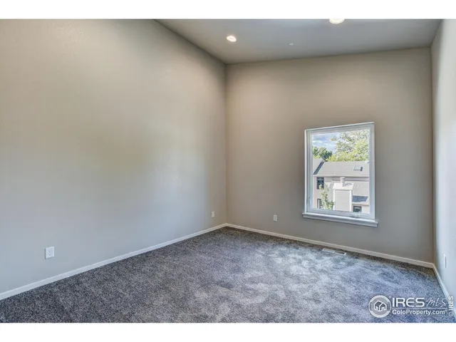 a view of empty room with windows