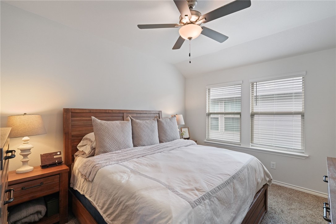 7601 Shadow Rider Lane Corpus Christi, TX 78414 - Photo 10 of 13 a bedroom with a large bed and a window