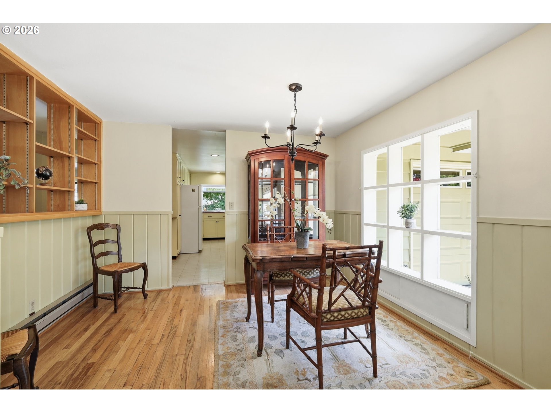 3025 Harris Street Eugene, OR 97405 - Photo 10 of 44 a view of a dining room with furniture window and wooden floor