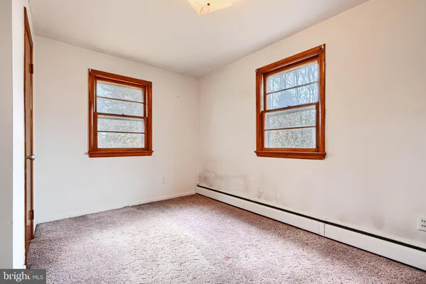 an empty room with window