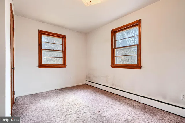 an empty room with window