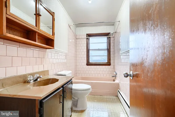 a bathroom with a sink and a bathtub