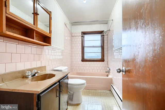 a bathroom with a sink and a bathtub