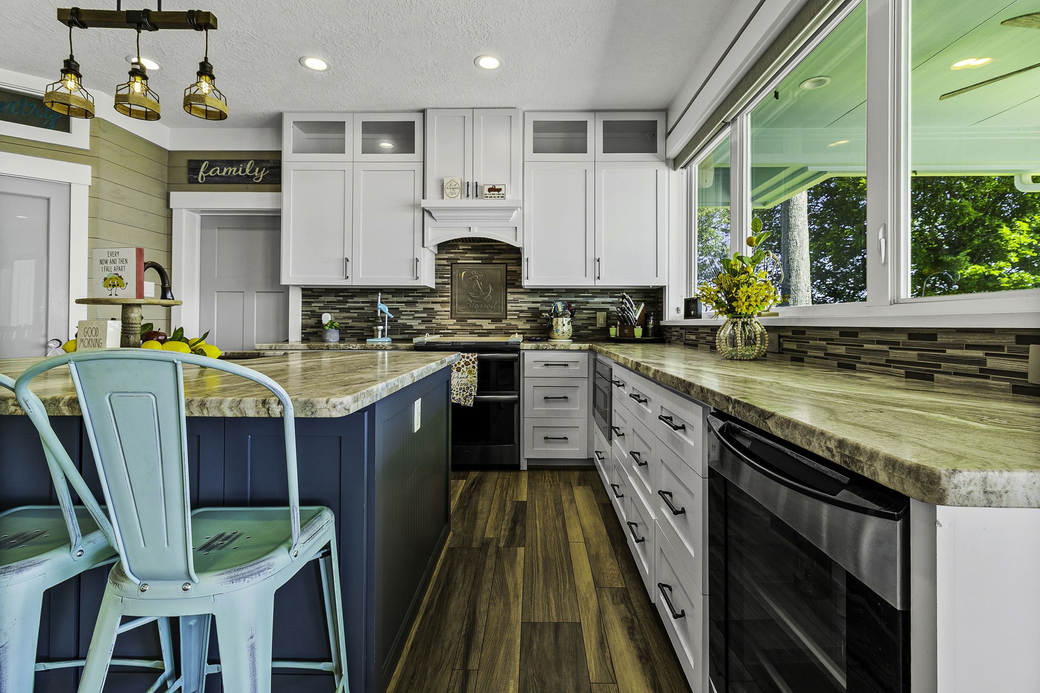 151 Key Largo Loop Point Blank, TX 77364 - Photo 14 of 49 Designed for serious cooks, the kitchen features extensive counter space, custom cabinetry, and a large entering island.