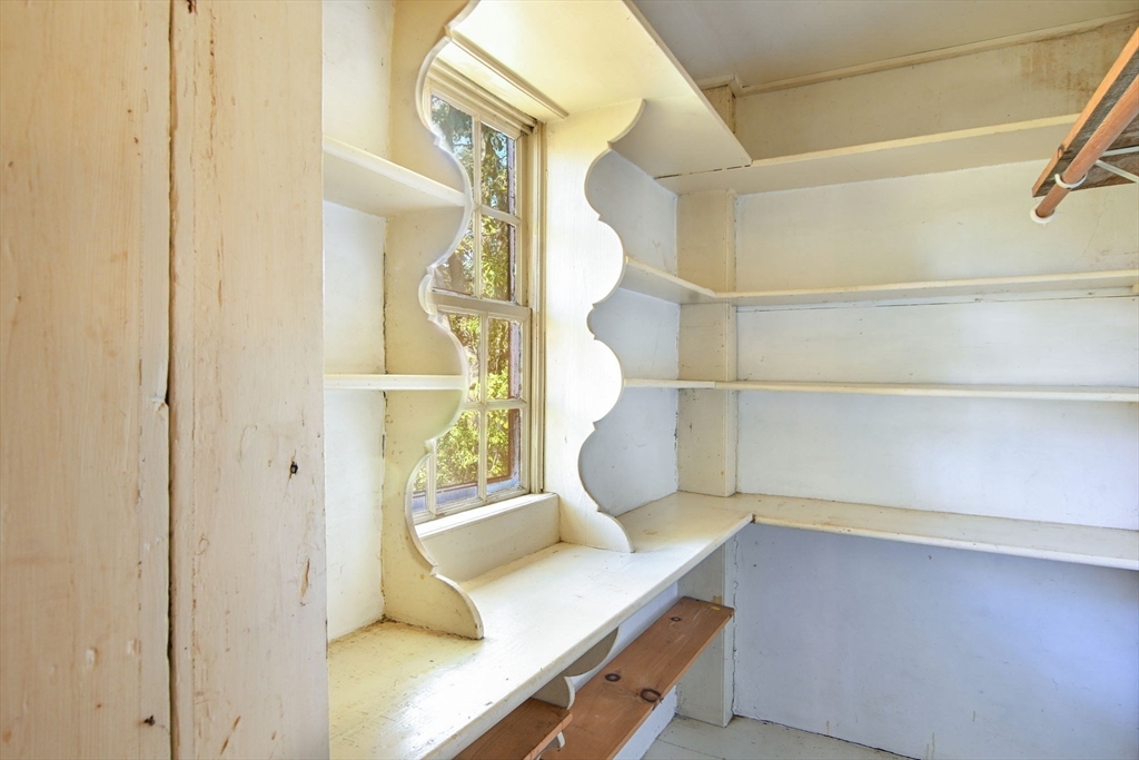 363 Main Street Acushnet, MA 02743 - Photo 14 of 35 a view of walk in closet with empty racks