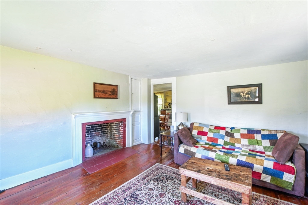 363 Main Street Acushnet, MA 02743 - Photo 24 of 35 a living room with furniture and a wooden floor