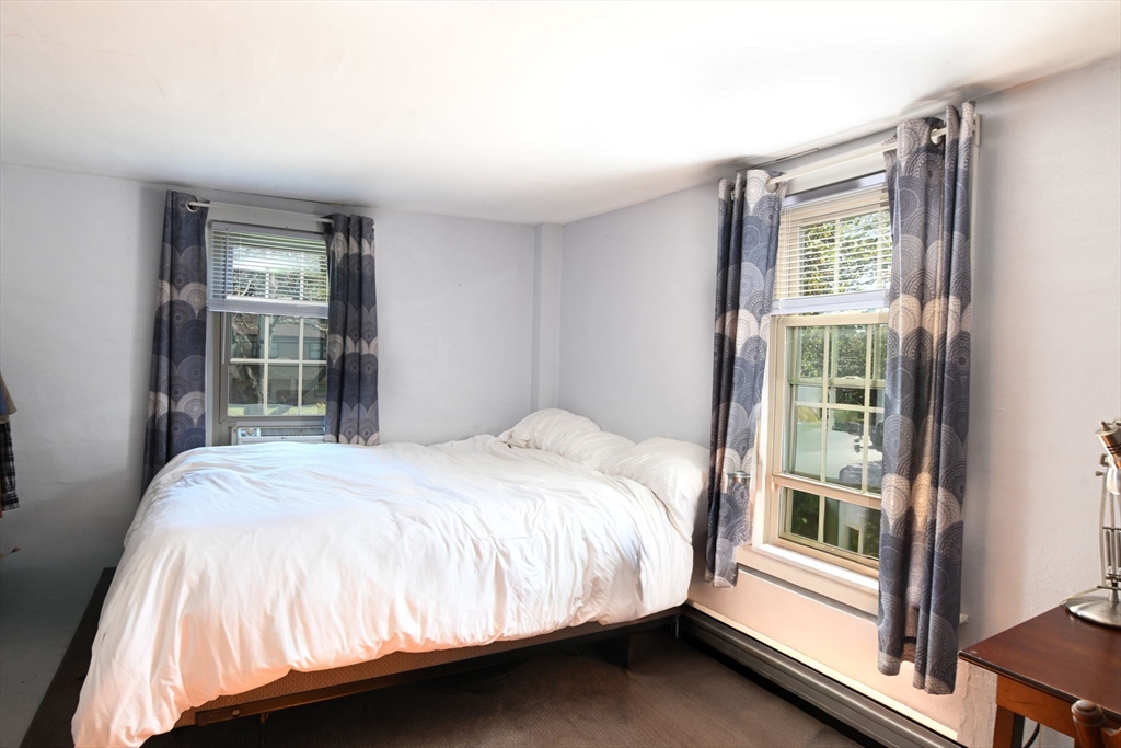 363 Main Street Acushnet, MA 02743 - Photo 25 of 35 a bedroom with a bed and a window