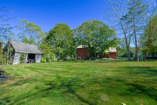 a view of outdoor space with trees all around
