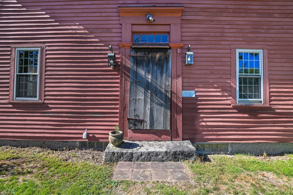 363 Main Street Acushnet, MA 02743 - Photo 4 of 35 a front view of a house with a yard