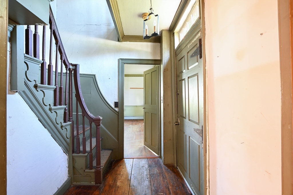 363 Main Street Acushnet, MA 02743 - Photo 8 of 35 a view of an entryway with wooden floor