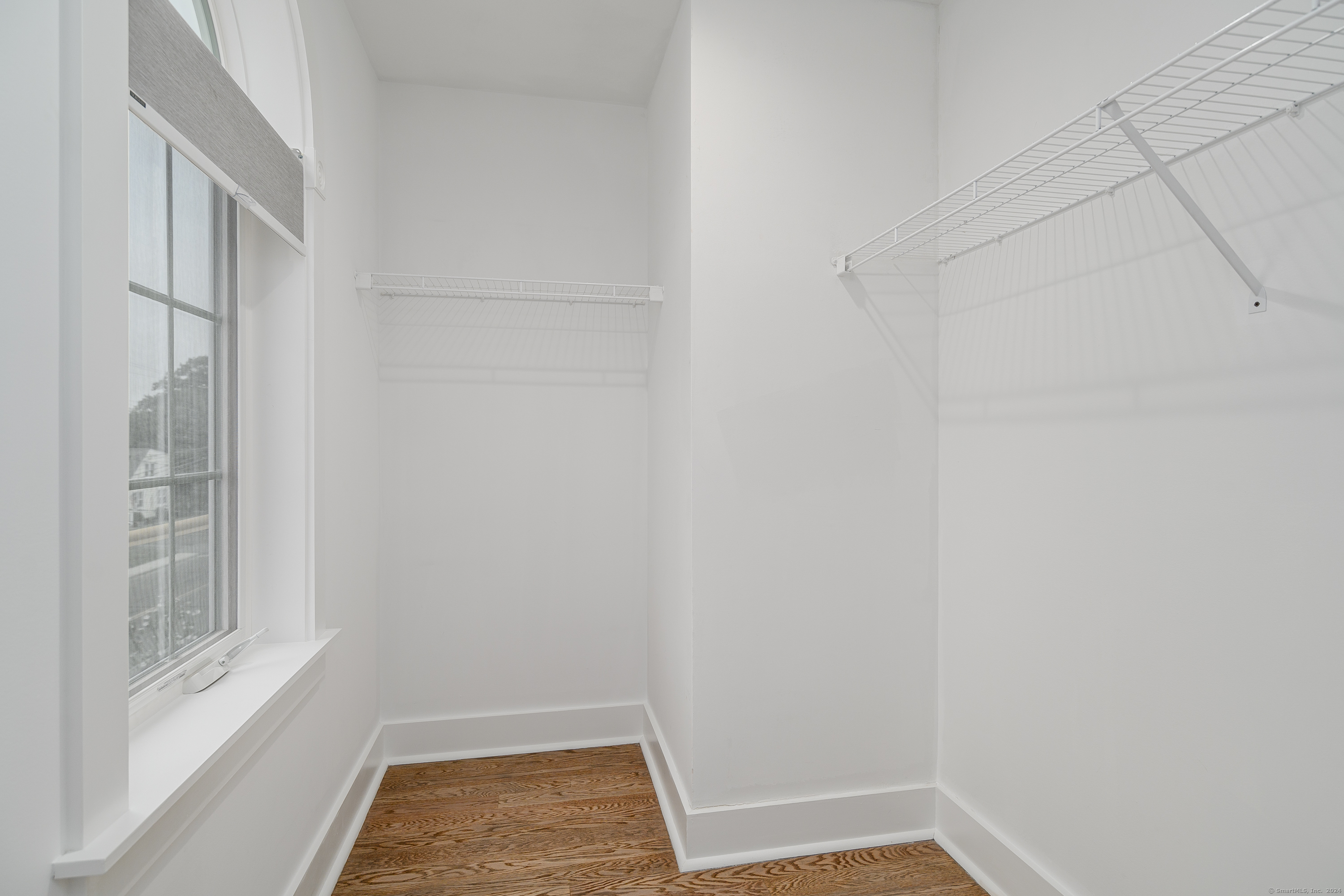 1033 Reef Road Fairfield, CT 06824 - Photo 20 of 32 a view of room with window