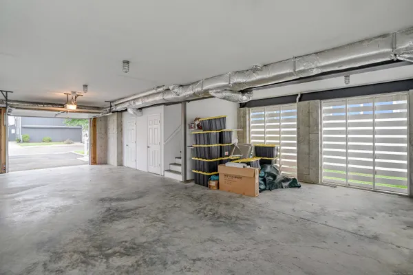 a view of a room with furniture and storage