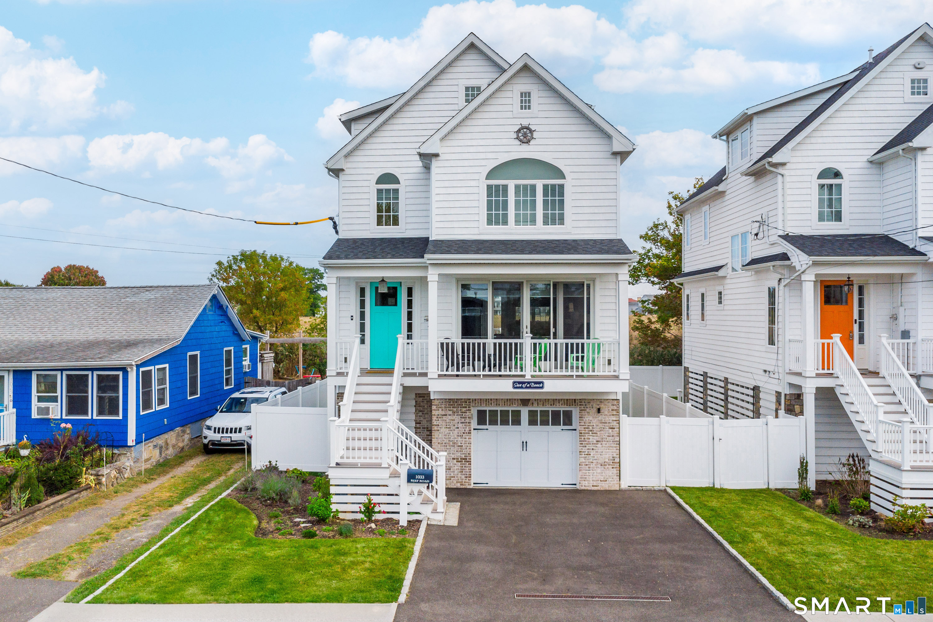 1033 Reef Road Fairfield, CT 06824 - Photo 9 of 32 a view of house with a yard