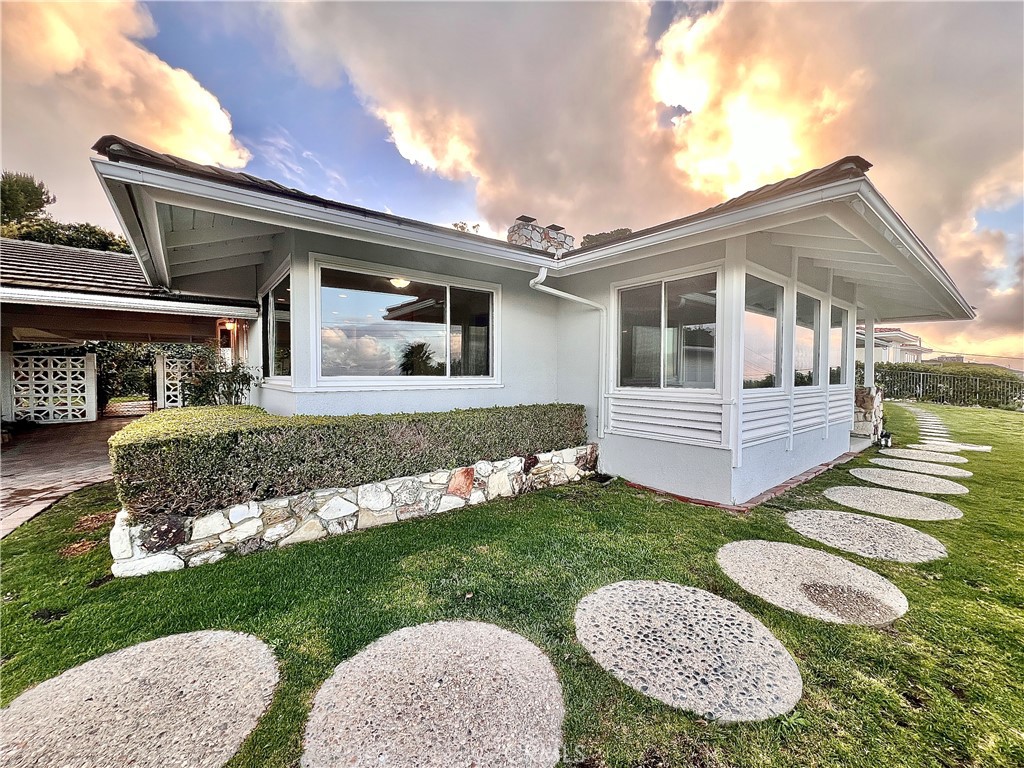 15 Mustang Road Rancho Palos Verdes, CA 90275 - Photo 1 of 1 a front view of a house with garden