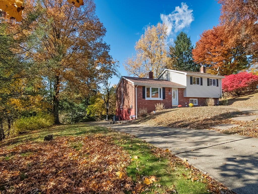 8459 Ridgemont Road Pittsburgh, PA 15237 - Photo 4 of 40 Welcome home to this multilevel gem in the heart of McCandless is situated on a wooded private lot with walking trails nearby.