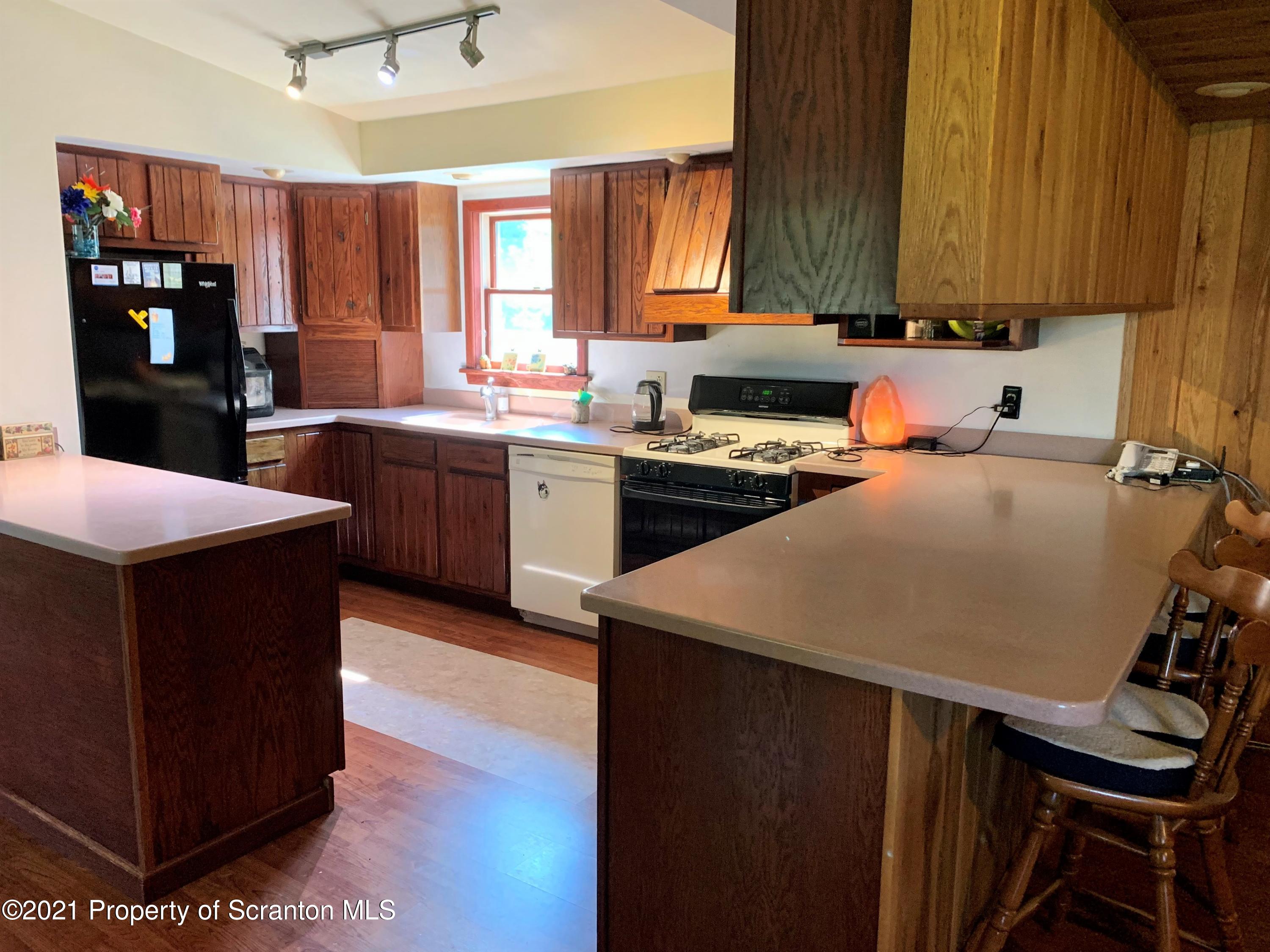 357 Sawmill Road Lake Ariel, PA 18436 - Photo 26 of 45 Corian counters, ample sunlight