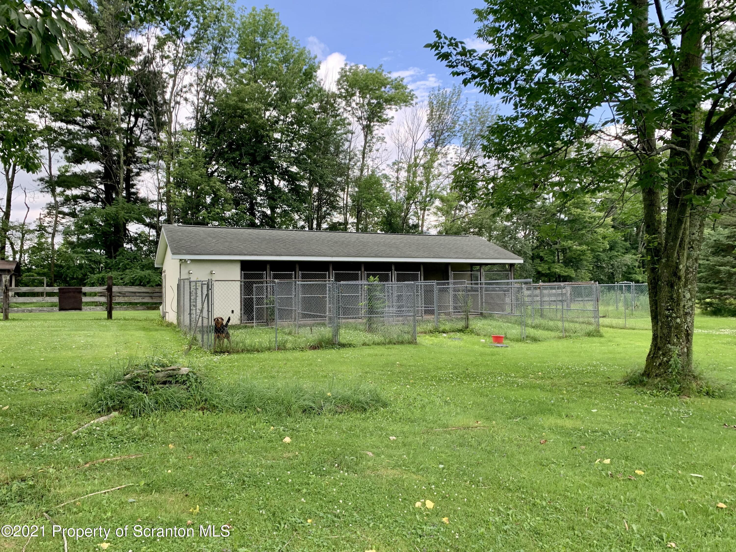 357 Sawmill Road Lake Ariel, PA 18436 - Photo 8 of 45 There's a big dog kennel