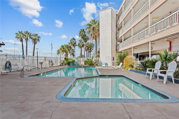 a view of a water with an ocean beach