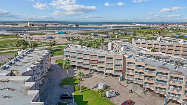 a view of a swimming pool with a lounge chairs
