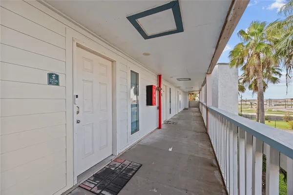 a view of a hallway with entryway