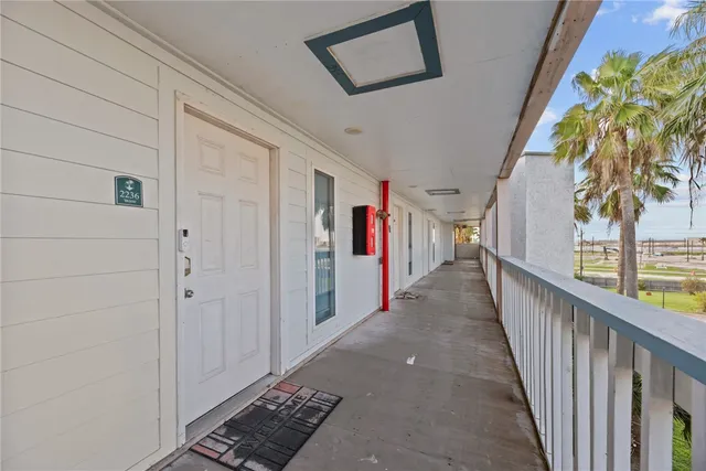 a view of a hallway with entryway