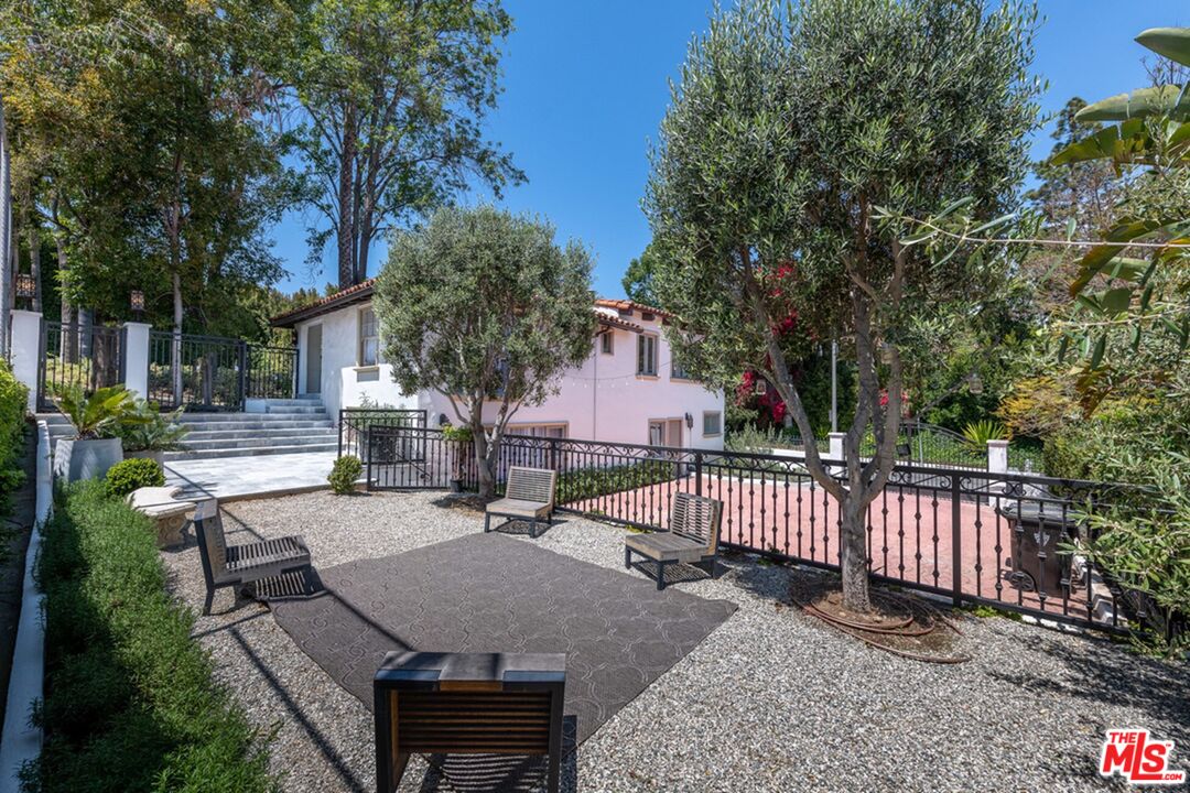 a view of a patio with a yard