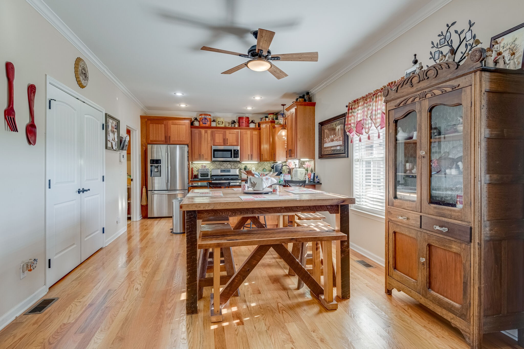 932 Goslin Branch Road Burns, TN 37029 - Photo 8 of 24 a view of kitchen with furniture and a wooden floor