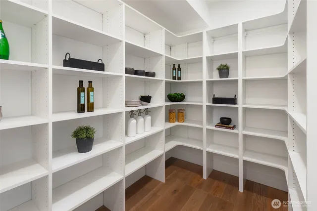 a living room with a book shelf