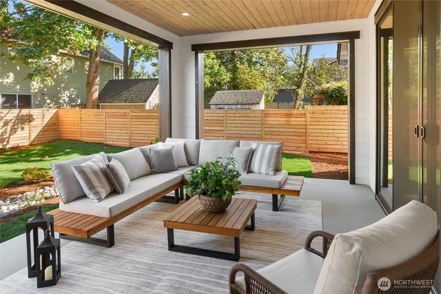 a outdoor living space with furniture and garden view