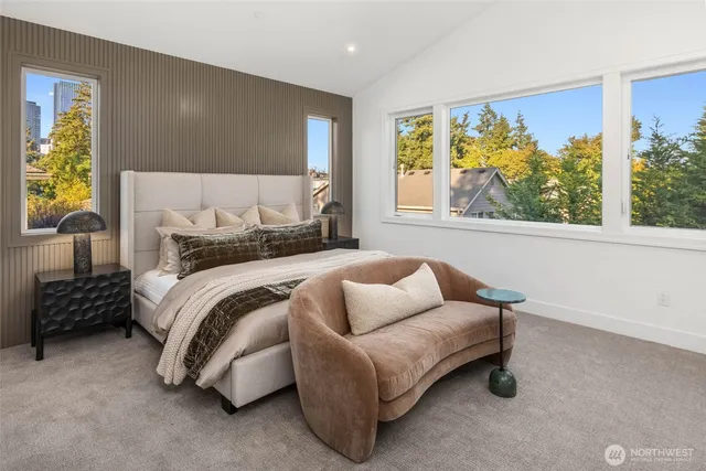 a bedroom with a bed and window