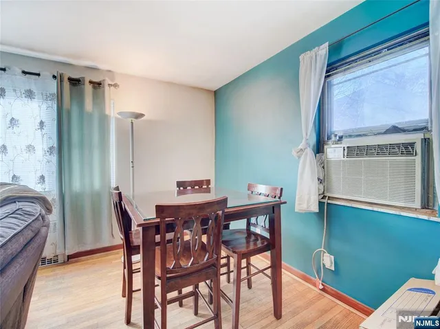a view of a livingroom with furniture and window
