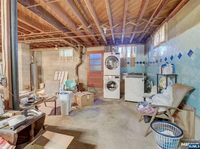 a living room with furniture and a clock