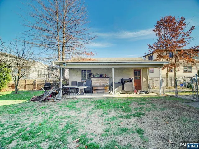 a front view of a house with garden and porch