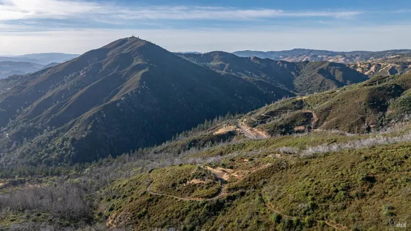 a view of a house with a mountain