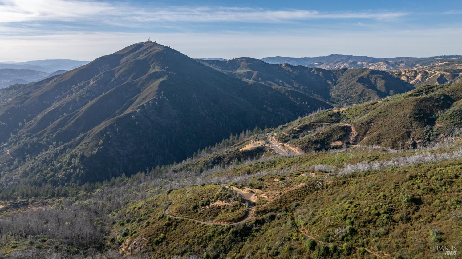a view of a house with a mountain