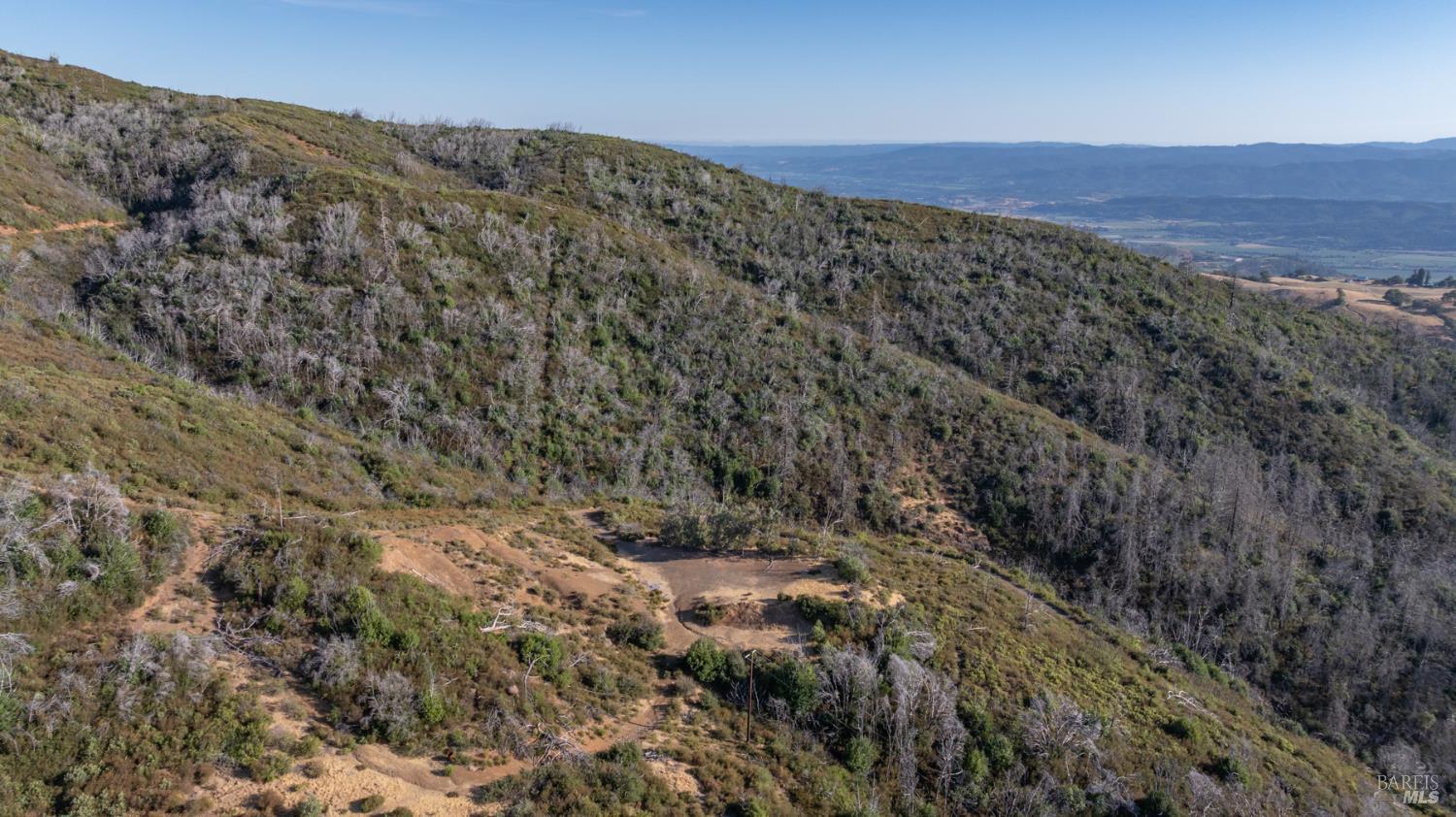 7051 Geysers Road Geyserville, CA 95441 - Photo 15 of 21 a view of a large mountains with lots of trees